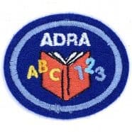 STEZOSLEDCI: ADRA – pismenost